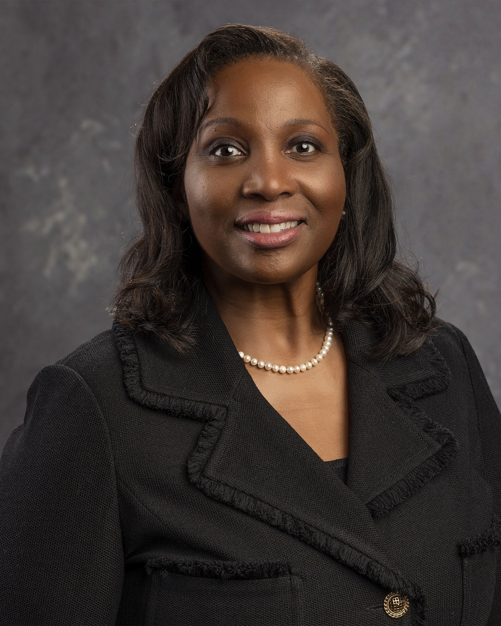 Official portrait of Federal Reserve Governor Lisa Cook.